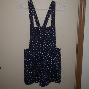 Blue overalls with white polka dots